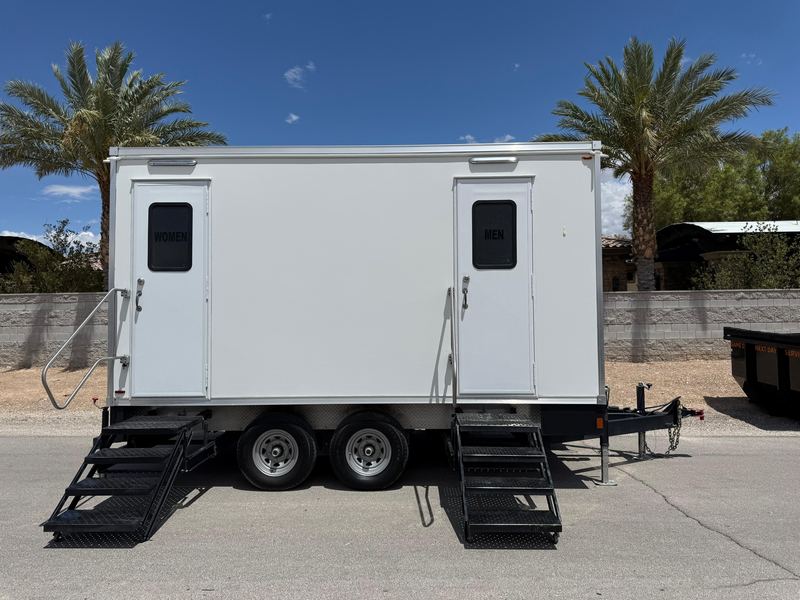 Two-room luxury restroom trailer with steps at each door